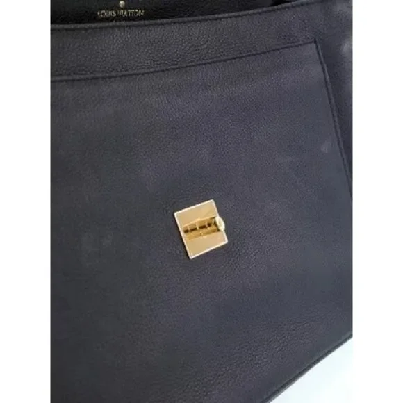 Louis Vuitton Lock Me MM Handbag - Picture 4 of 9